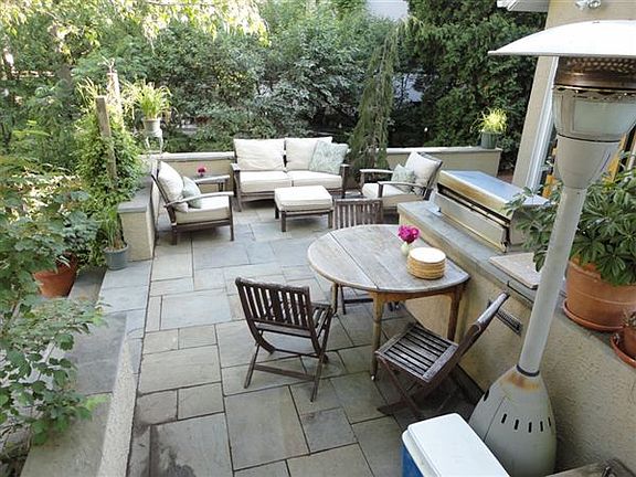 Back patio with built-in grill