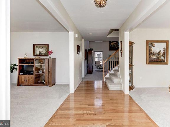 Spacious Foyer with Hardwood Floor.