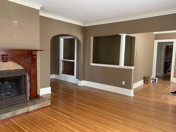 LIVING ROOM LOOKING AT FRONT STAIRS