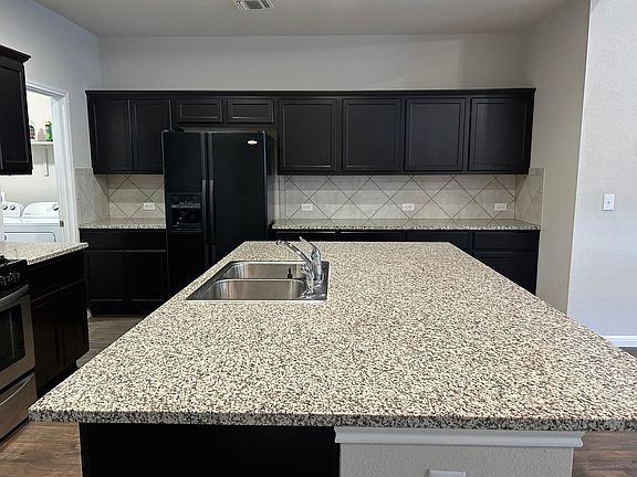 Kitchen - Refrigerator is included