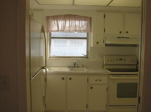 Kitchen-glass top stove, lots of storage