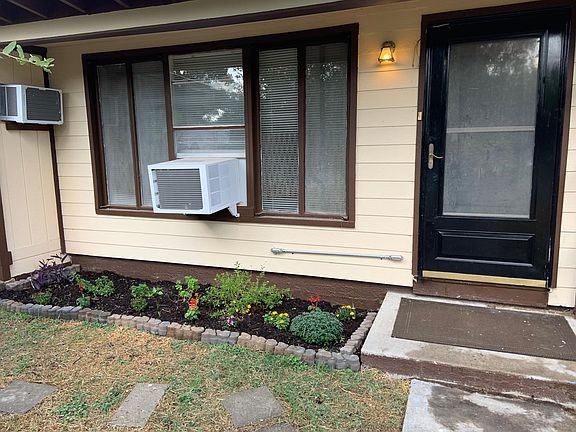Front door and flower bed