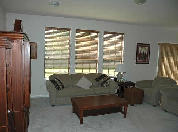 Open den w/ wall of windows! 