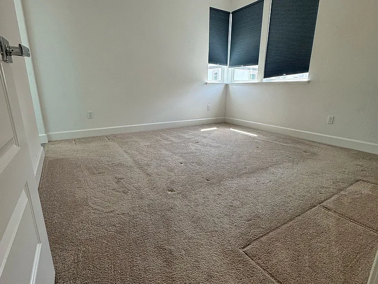 Master Bedroom, the room is bigger than it appears in the picture. Can easily fit two night stand, dresser, cal-king bed and still have some extra free space