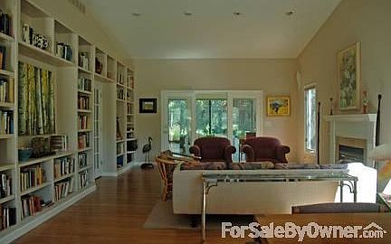 Living Room
						:
						Wood floors, beautiful book shelves, gas fireplace. French doors to office/den.
