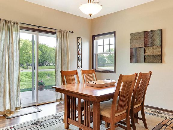 Large informal dining space opens on to the patio for  grilling or relaxing.