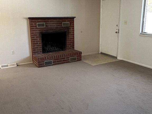 Living room, showing fireplace