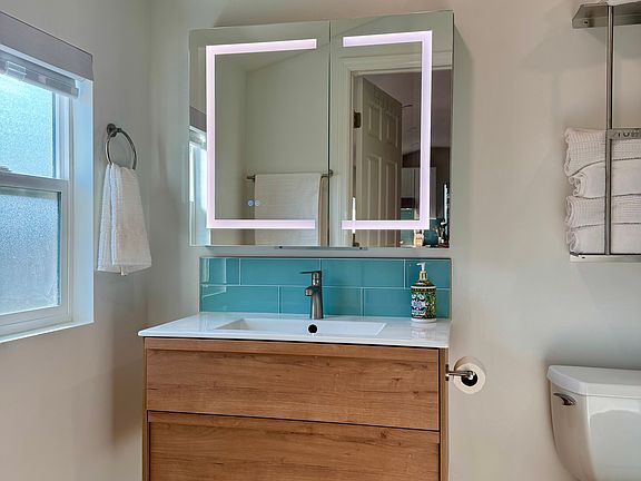 Make-up lighting from the mirror makes getting ready easy.