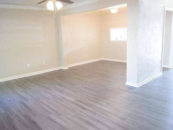 HUGE living/dining space with large pass through window to kitchen