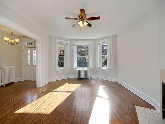 Living room with bay windows