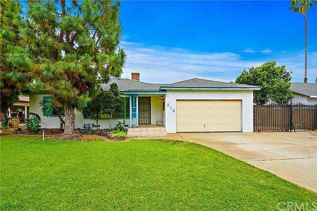FRONT OF HOUSE, HUGE FENCED LOT