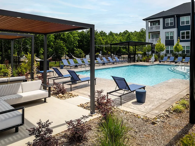 Pool and sundeck with cabanas