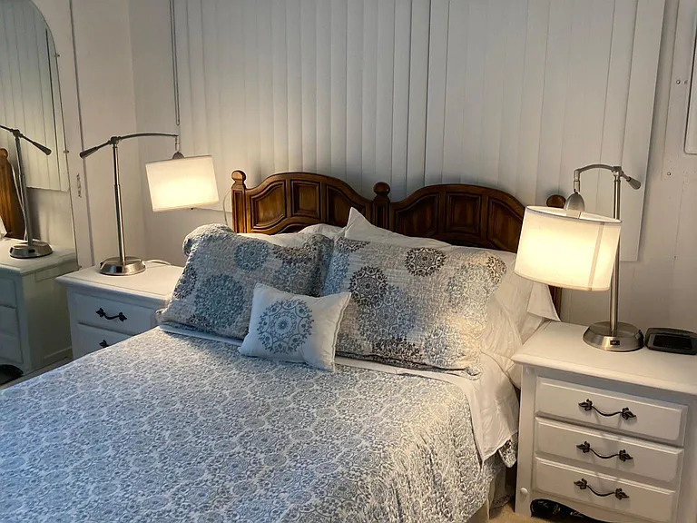 Another shot of the guest room with a closed window into the shed that was apparently built after this Doublewide was created!