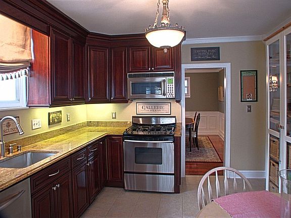 Cherry cabinets, granite countertops and stainless appliances