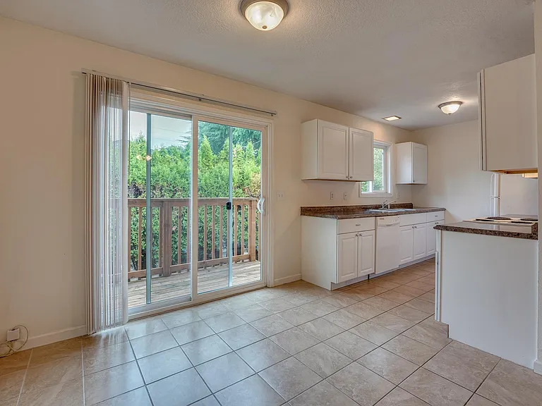 Kitchen 2, with view of back deck slider