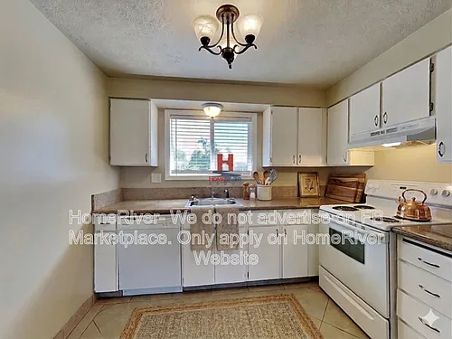 3211 S Regal St #5 Photo 1