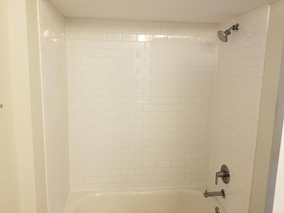 Shower/Tub with white subway tile