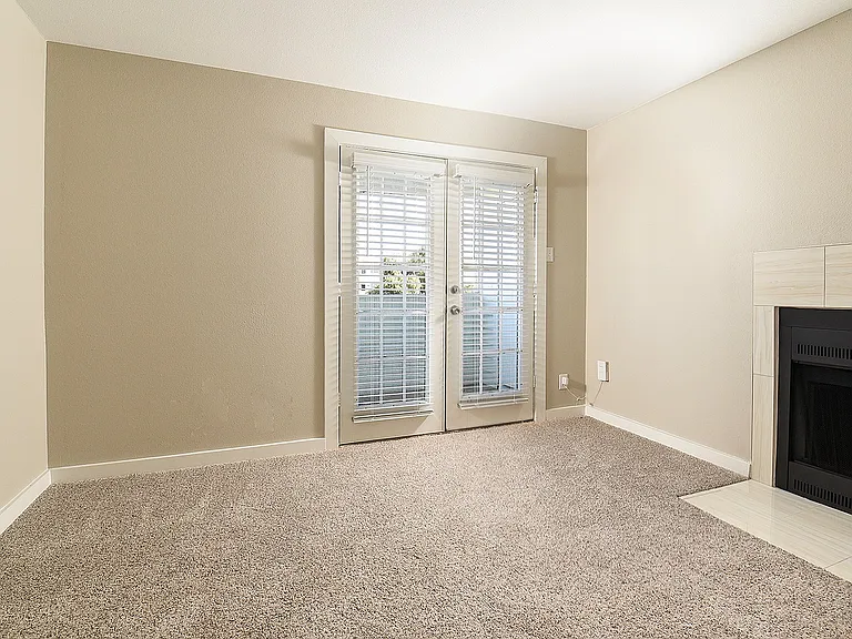 Designer One Bedroom Living area with Fireplace and French Doors