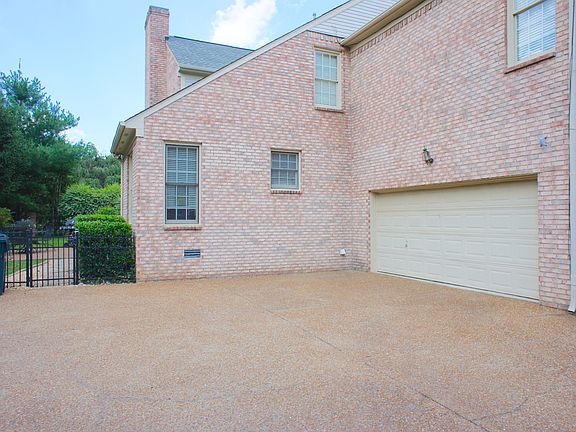 Rear Entry Garage & Paved 