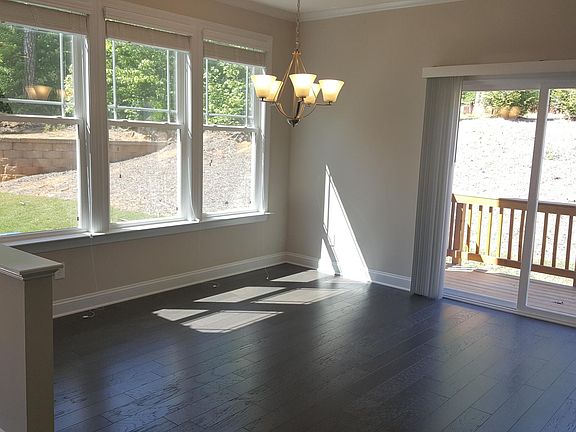 Dinning room has a ton of light and access to the rear deck