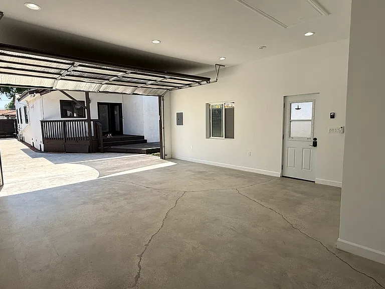 Remodeled detached garage with a large window, full bathroom, separate entrance, heating and air conditioning, dimmable recessed LED lighting, and approximately 545 square feet. Ideal for a home office, gym, creative studio, media room, playroom, etc.