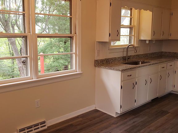 View of the deck and backyard from the eating area