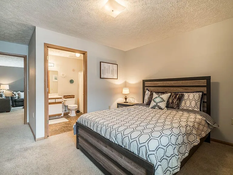 A private en-suite layout makes this bedroom feel like your own personal retreatperfect for winding down after a long day.