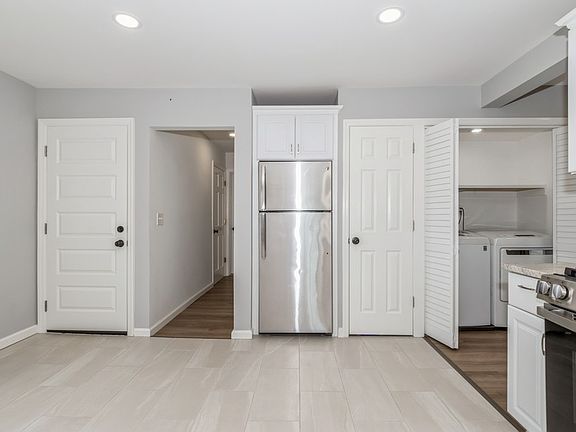 New Kitchen and Laundry Area with Washer and Dryer