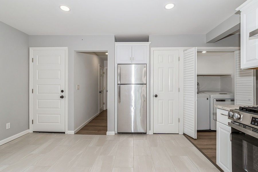 New Kitchen and Laundry Area with Washer and Dryer