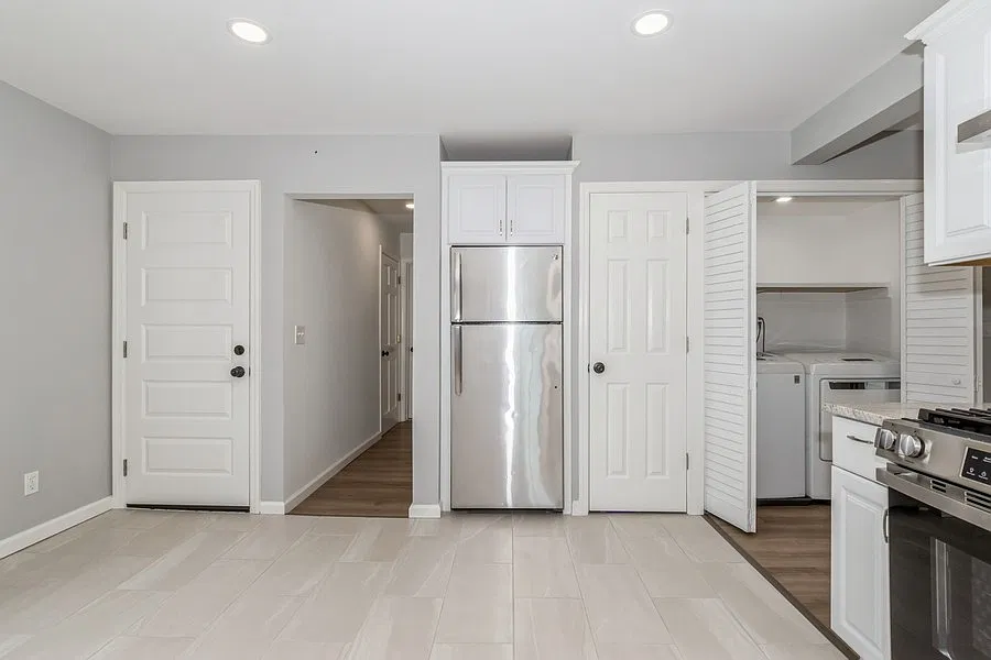 New Kitchen and Laundry Area with Washer and Dryer