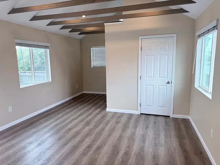 High ceilings with open beams.