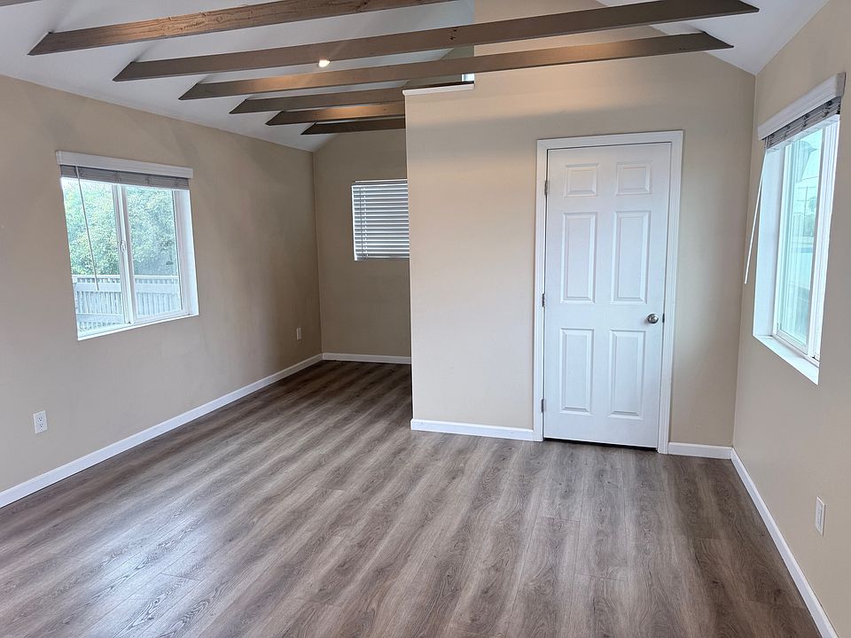 High ceilings with open beams.