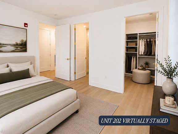 Unit 202 Virtually Staged Primary Bedroom