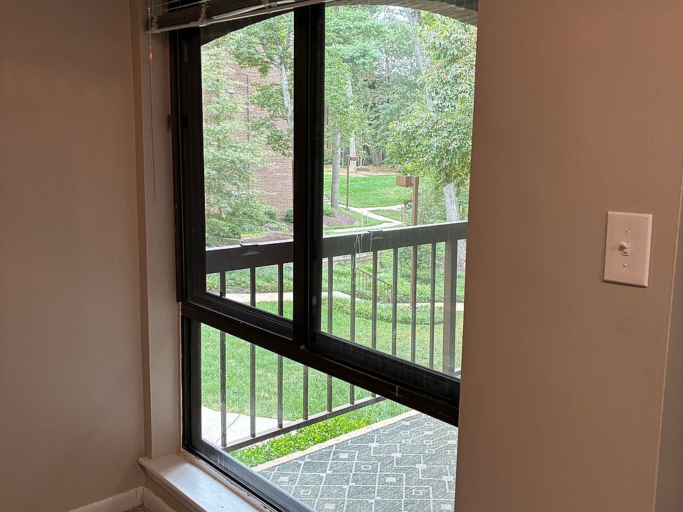 window to patio in the den