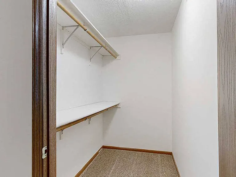 Ample built-in closet storage in our 1-bedroom Imperial.