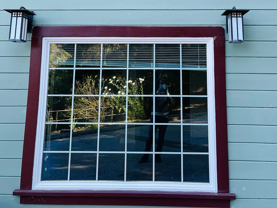 Large picture window in bedroom
