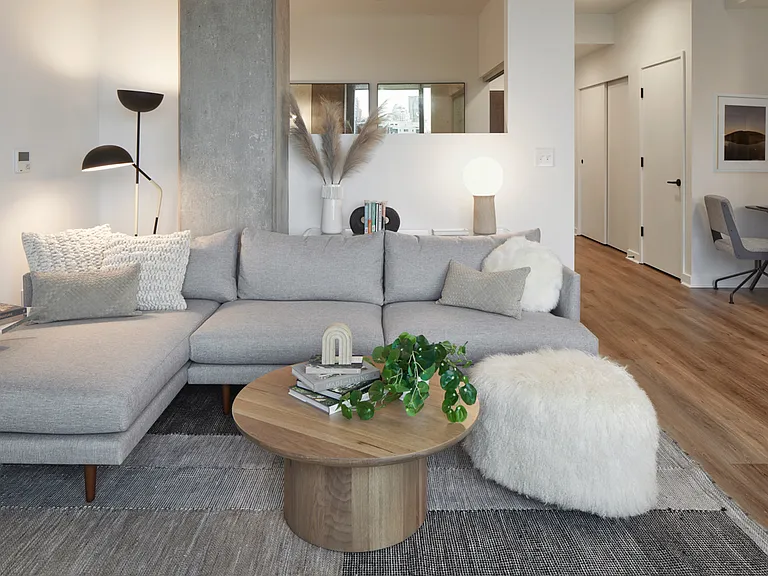 Apartment living room with wood-style flooring.