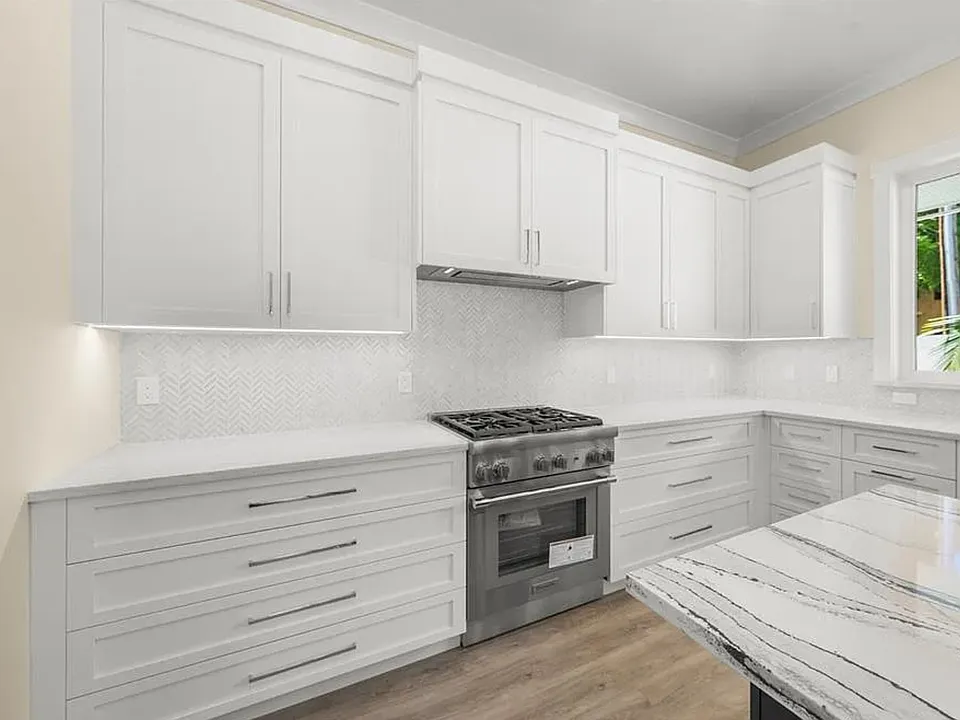 large chef friendly kitchen. Lot's of storage and stocked with dishes, cookware and utenciles.