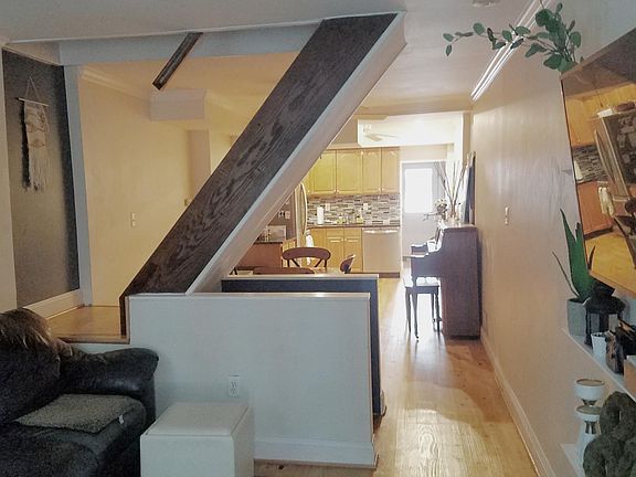 View of first floor space and stairs