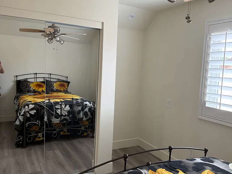 All closets in home have lights inside them with convenient wall switches. 3 bedrooms have mirrored closet doors. Obviously this is one of them :)