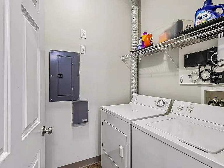 Modern laundry room with high-efficiency washer and dryer