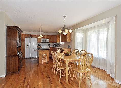 Gorgeous Hardwood Floors and spacious Bay Window!