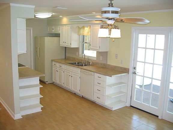 Kitchen and French Doors to Patio!