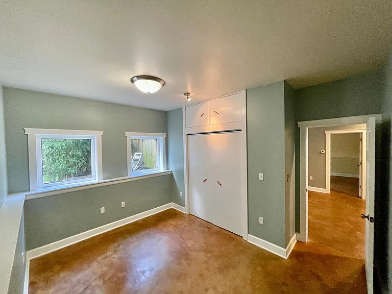 Bedroom 2 (Southeast) recently painted. Hypoallergenic radiant floors keep you cool all summer and feet warm all winter.