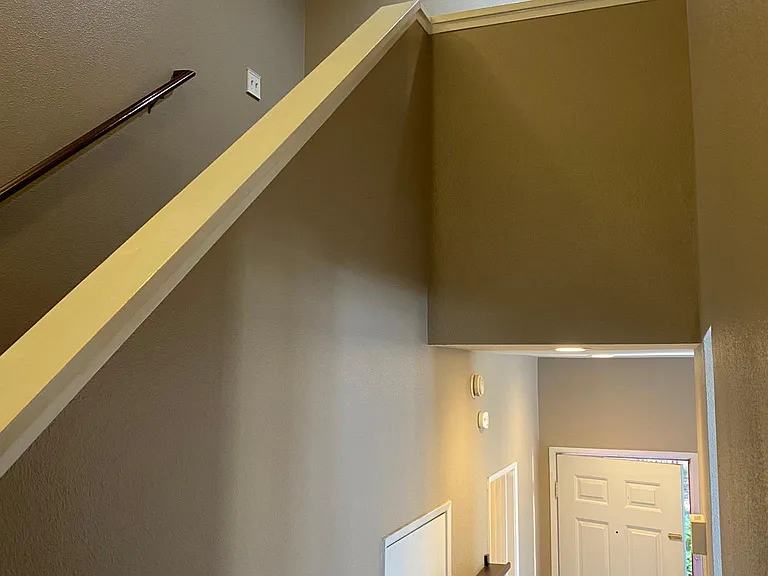 Ground floor includes 1/2 bath and additional storage closet before stairs to 2nd floor bedrooms.