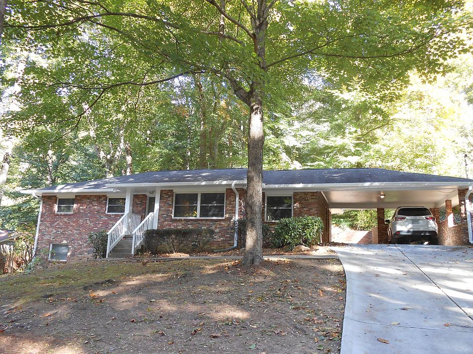 Carport opens to back patio.
