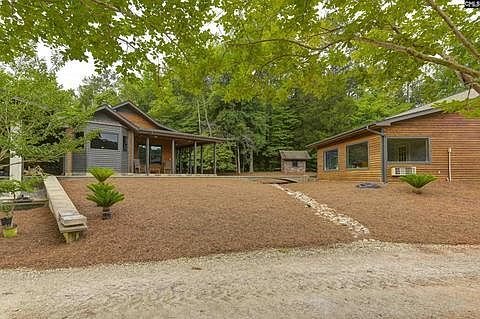 Main house with oversized-garage and workshop.