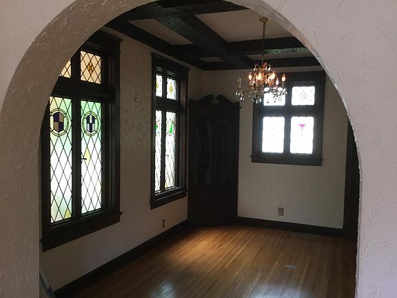 Original Stained glass windows and wooden beams