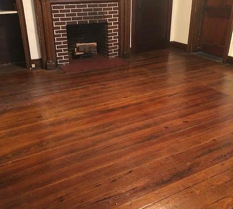 The oldest part of the house, a pre-Civil war building with wide plank flooring and a non-working fireplace.