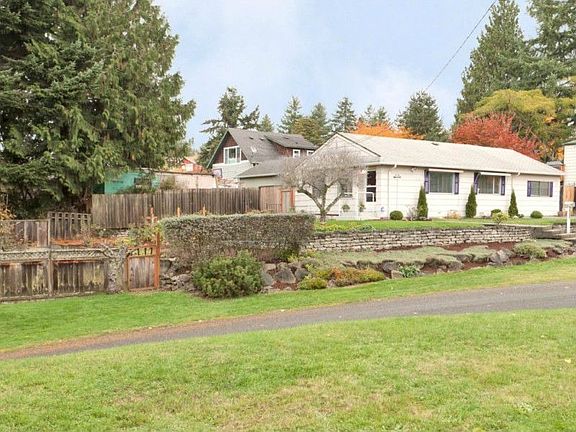 First time on the market in 50 years! Built in 1948, this is a charming, well loved home. South facing Living Room and Bedrooms get lots of natural light. To right of photo, in front of gate, is offstreet parking for 4+ cars. Extra large lot allows for expansion, or build your dream home some day?
